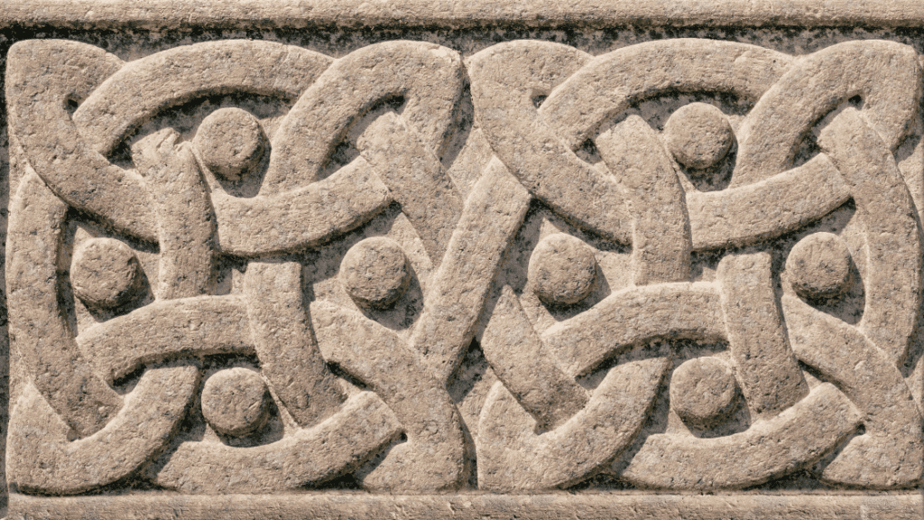 A series of Celtic knots etched into stone