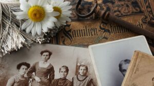 vintage photos and keepsakes arranged on a table