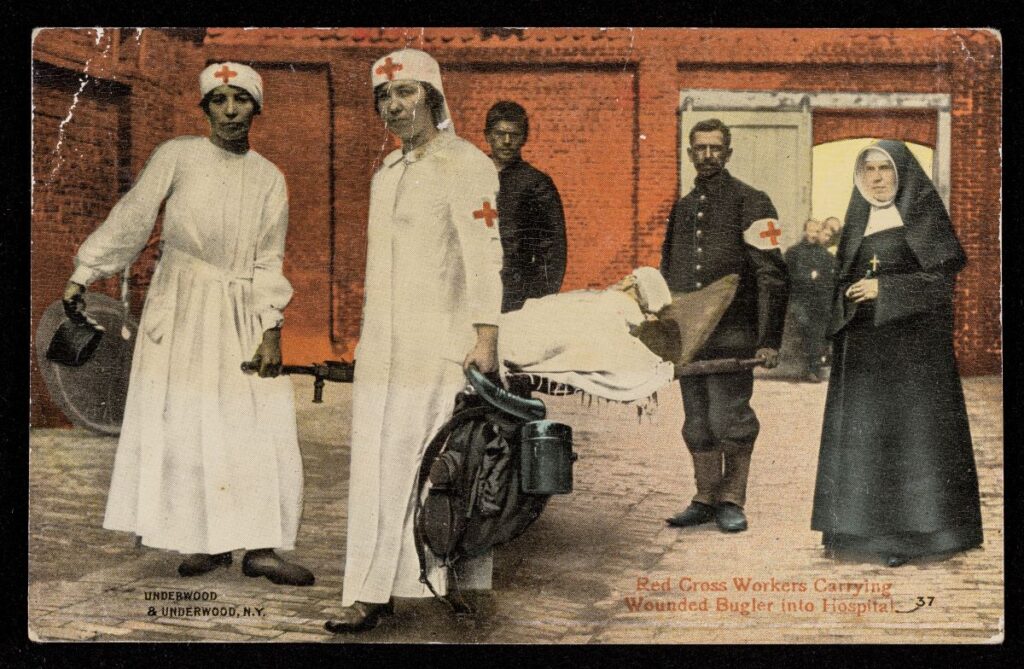 vintage photograph of Red Cross cultural symbols with nurses, a nun, and a soldier carrying an injured bugler on a stretcher 