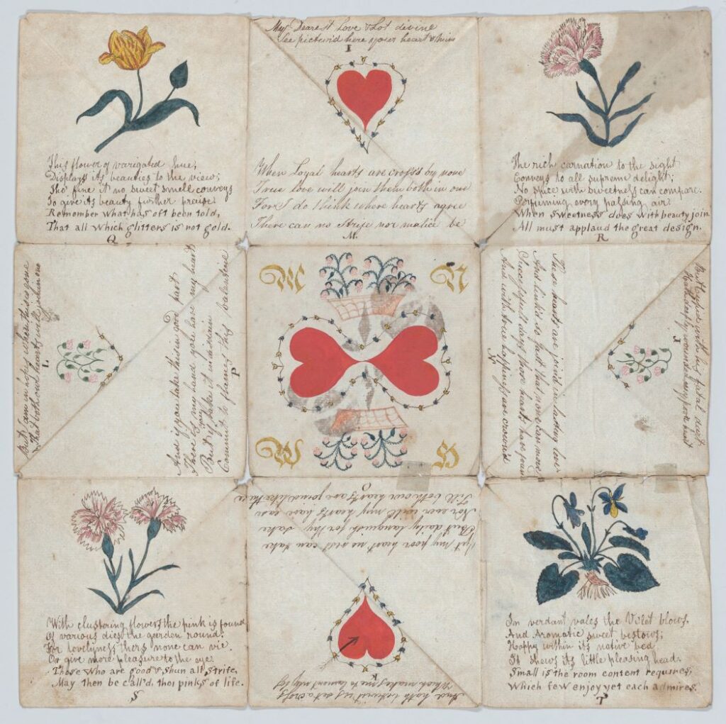 a Valentine's Day purse puzzle with hears, flowers, and writing